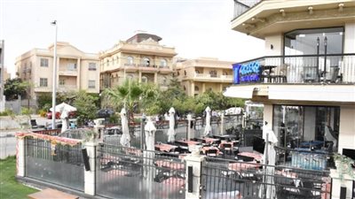 بالصور | حملة مكبرة لتنفيذ قرارات غلق وتشميع وضبط الشارع بالتجمع الأول