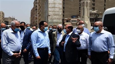 بالصور | مدبولي يتفقد الأعمال بمحور محمد أنور السادات 