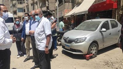 بالصور | محافظ الجيزة يوجه بكلبشه سيارات الانتظار الخاطئ بطريق المريوطية