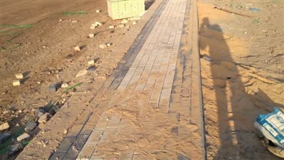 استمرار أعمال رفع كفاءة وتطوير شارع محمد سرحان بحي الزهور ببورسعيد