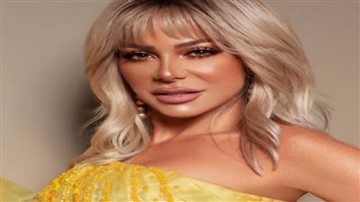 سوزان نجم الدين تتالق بفستان أصفر | صور 