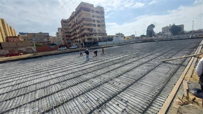 محافظة بورسعيد:تواصل أعمال رصف شارع أسوان بنطاق حي المناخ 