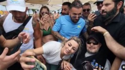 جورج وسوف يظهر على كرسى متحرك.. وجمهوره يلتقط الصور التذكارية معه