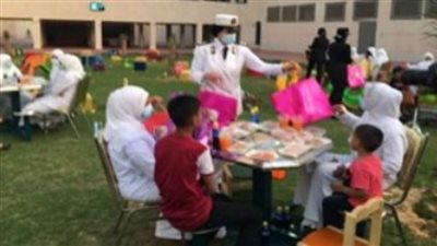 بالصور.. الداخلية توزع ملابس على الأطفال الأيتام وذوى الهمم فى العيد